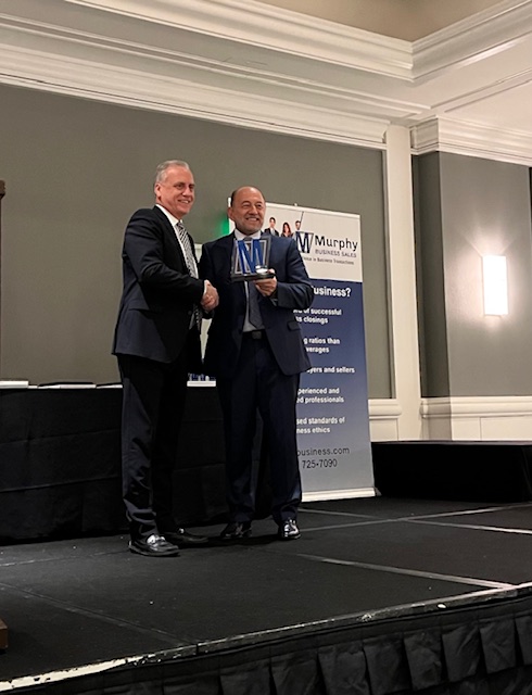 Hal Feder receiving an award